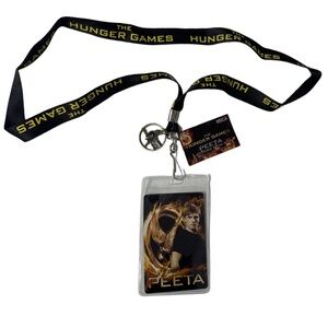 2012 LGF THE HUNGER GAMES lanyard with peeta + mockingjay pin, BNWT.